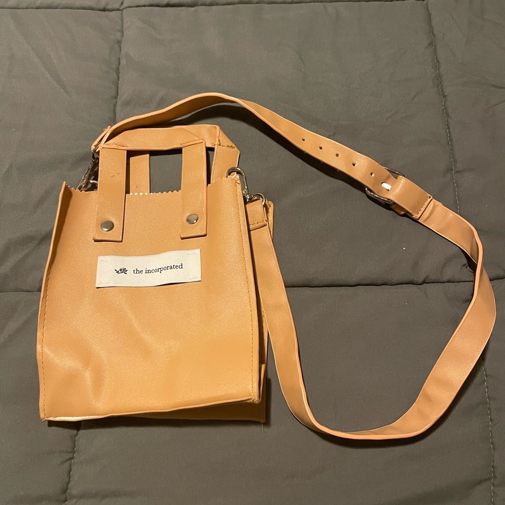 The Incorporated mini tote leather